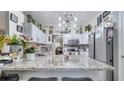 Spacious kitchen with granite countertops and stainless steel appliances at 405 Mallard Ln, Kissimmee, FL 34759