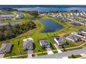 Aerial view showing the house's location in a lakefront community at 4150 Sunset Preserve Blvd, Orlando, FL 32820