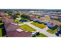 Aerial view of a suburban neighborhood with new homes at 459 Cinnamon Dr, Kissimmee, FL 34759