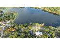 Overhead view of lakefront homes and properties showcasing the neighborhood's waterfront access at 632 Oakhurst St, Altamonte Springs, FL 32701