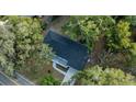An aerial shot of the property featuring a newly installed roof and a private driveway at 632 Oakhurst St, Altamonte Springs, FL 32701