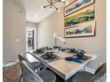Elegant dining room with stylish table setting and modern chandelier at 244 Villa Domani Cir, Davenport, FL 33896