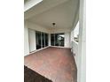 Spacious covered patio with brick pavers at 5015 Dancy Ln, Saint Cloud, FL 34772