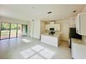 Bright kitchen features modern appliances and an island at 2335 Datura Loop, Saint Cloud, FL 34772