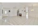 Bright living room featuring a fireplace and tile floors at 250 Silas Phelps Ct, Orlando, FL 32828