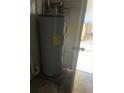 Energy-efficient water heater in a utility closet at 5465 Lescot Ln, Orlando, FL 32811