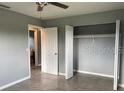 Cozy bedroom offering a closet and neutral paint at 2302 E Dana Dr, Deltona, FL 32738