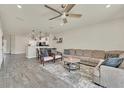 Spacious living room with a comfortable couch and tile floors at 3780 Plainview Dr, Orlando, FL 32824