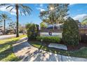 Sandhill Preserve community entrance with brick pillars and landscaping at 2620 Sand Arbor Cir, Orlando, FL 32824