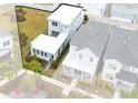 Aerial view showcasing a modern home's unique design and lot size at 13104 Markowitz Aly, Orlando, FL 32827