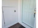 A close up of the front door showing a keyless entry system at 2059 Town Pasture Dr, Eustis, FL 32726