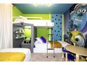 Whimsical bedroom features custom bunk beds, vibrant colors, and playful decor at 4294 Lana Ave, Davenport, FL 33897