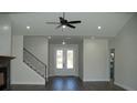 Bright and spacious entryway with double doors and staircase at 1712 Lake Alden Dr, Apopka, FL 32712