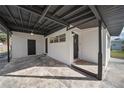 Exterior view showing a side entrance and car port at 133 Pinecrest Dr, Sanford, FL 32773