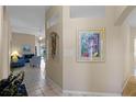 Bright and spacious entryway with tile flooring, leading to the living room and other areas at 401 Montara Dr, Davenport, FL 33897