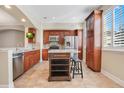 Modern kitchen with granite countertops and stainless steel appliances at 4712 Anson Ln, Orlando, FL 32814
