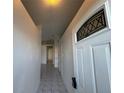 Bright entryway with tile flooring and access to other rooms at 147 Dahlia Village Cir # Ge, Orlando, FL 32807