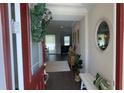 Bright and airy entryway with a view into the living area at 9271 Patrimonio Loop, Windermere, FL 34786