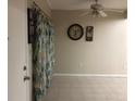 Clean entryway with tile floors and colorful curtains at 134 W America St # 29, Orlando, FL 32801