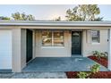 Newly renovated home with a front porch at 1307 Pine Lake Rd, Orlando, FL 32808