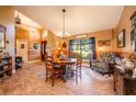 Charming dining room featuring a wood table and comfortable seating at 710 Kellys Cv, Ocoee, FL 34761