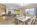 Spacious kitchen with an island and breakfast bar at 3151 Riachuelo Ln, Kissimmee, FL 34744