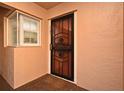 Condo entrance with security door and window at 610 Cranes Way # 307, Altamonte Springs, FL 32701