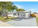 Newly paved driveway and freshly painted home exterior at 4917 Tam Dr, Orlando, FL 32808