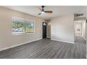 Bright living room featuring hardwood floors and neutral walls at 4917 Tam Dr, Orlando, FL 32808