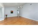 Bright living room with high ceilings and laminate flooring at 731 Red Coach Ave, Deltona, FL 32725