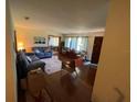 Spacious living room with hardwood floors and ample natural light at 1520 Moravia Ave, Holly Hill, FL 32117