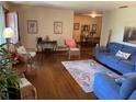 Bright living room with hardwood floors and access to dining area at 1520 Moravia Ave, Holly Hill, FL 32117