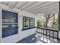 Front porch with blue door and view of the yard at 805 Willow Ave, Sanford, FL 32771