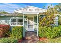 House entrance with columns and lush landscaping at 811 Briercliff Dr, Orlando, FL 32806