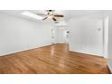 Bright living room with hardwood floors and skylight at 811 Briercliff Dr, Orlando, FL 32806