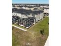 Backyard with private screened pool and patio at 8900 Takeaway Way, Davenport, FL 33896