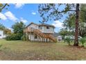Unique circular home with elevated deck and large backyard at 1399 Old Mount Dora Rd, Eustis, FL 32726