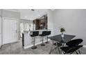 Kitchen with breakfast bar and seating for three at 1207 Lucaya Cir, Orlando, FL 32824