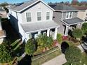 Two-story house, landscaped yard, and neighboring homes visible at 11743 Stein St, Orlando, FL 32832