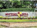 Notting Hill community entrance sign with landscaping at 1341 Arbor Vista Loop # 113, Lake Mary, FL 32746
