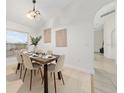 Dining area with hardwood floors and modern decor at 632 Kermarah Ave, Haines City, FL 33844