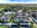 Aerial view of community building and parking at 4849 Cypress Woods Dr # 1310, Orlando, FL 32811