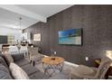 Open living space with a view of the kitchen and a modern aesthetic at 1041 Las Fuentes Dr, Kissimmee, FL 34746