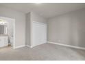 Spacious bedroom with neutral-toned carpet and a large closet at 7749 Sweet Star Ave, Orlando, FL 32836