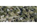 Aerial view of a house and surrounding neighborhood at 121 Valencia Dr, Edgewater, FL 32132