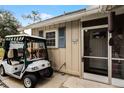 House exterior with golf cart and entrance at 1339 Villa Ln # 50, Apopka, FL 32712
