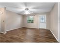 Bright living room with hardwood floors and ceiling fan at 3116 Oranole Rd, Orlando, FL 32810