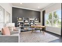 Bright office with large window, built-in shelving, and workspace at 5190 Foothills Preserve Loop, Mount Dora, FL 32757