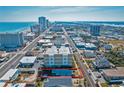Daytona Beach real estate featuring an aerial view of a charming home near the ocean and local attractions at 718 N Grandview Ave, Daytona Beach, FL 32118