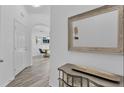 Bright and airy entryway with wood-look floors at 9051 Treasure Trove Ln # 301, Kissimmee, FL 34747
